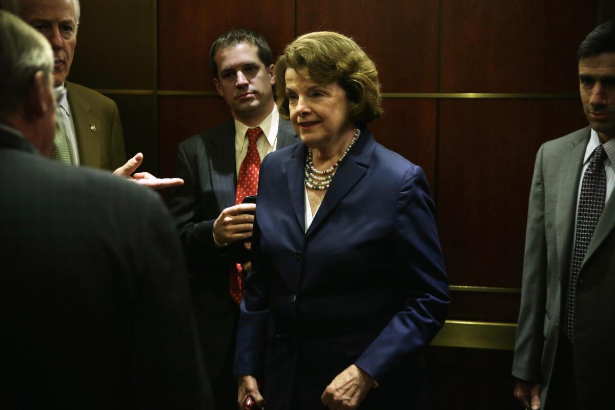 Sen. Dianne Feinstein (D-Calif.) and other senators arrive for a closed-door briefing on the Obama administration's prisoner swap that resulted in the return of Army Sgt. Bowe Bergdahl.