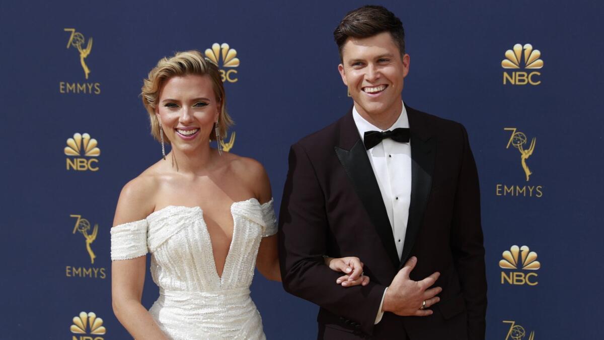 Actress Scarlett Johansson and "Saturday Night Live" star Colin Jost are engaged.