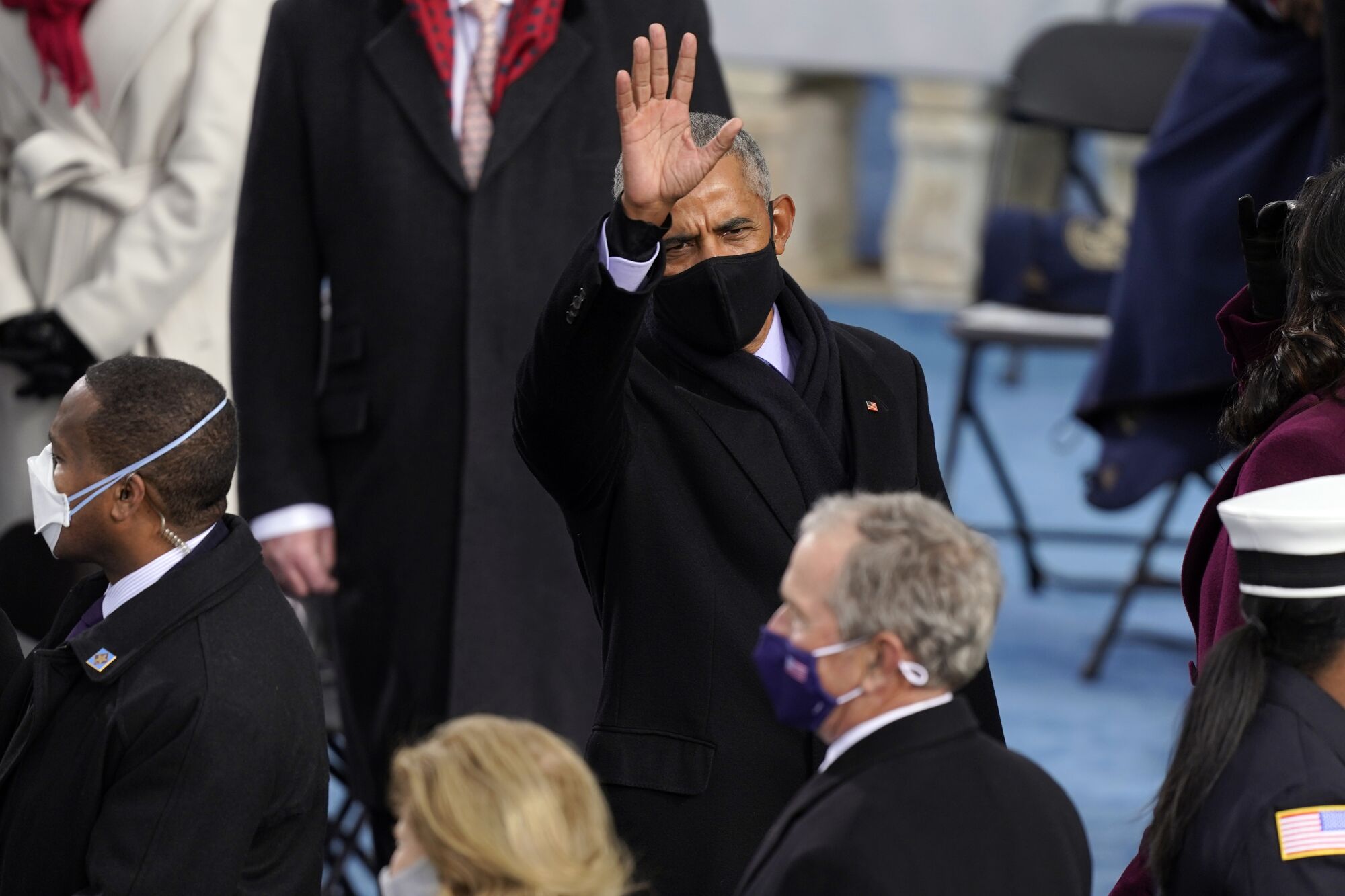 Former President Obama arrives at the inauguration of President Biden.