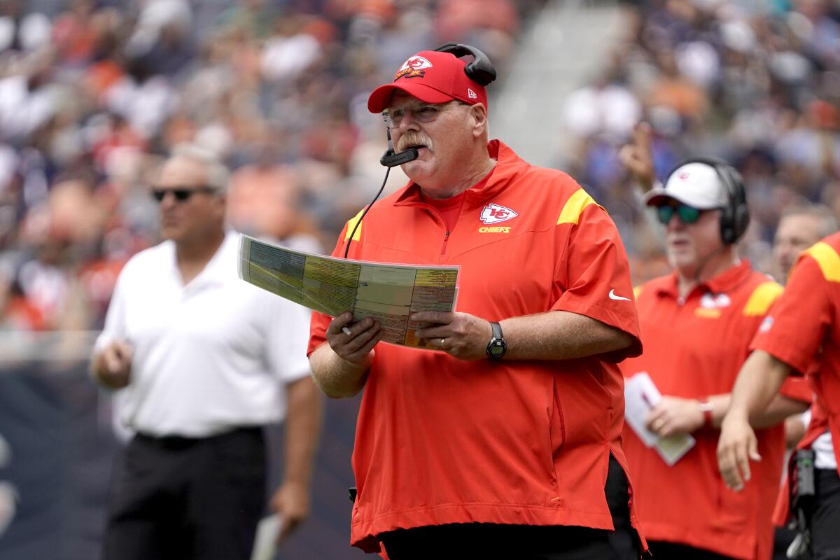 FILE - Kansas City Chiefs head coach Andy Reid calls a play during the first half of an NFL preseason football game against the Chicago Bears, Saturday, Aug. 13, 2022, in Chicago. Reid is 8-1 in season-openers since arriving in Kansas City, and an even more incredible 5-0 when those games are played on the road. (AP Photo/David Banks, File)