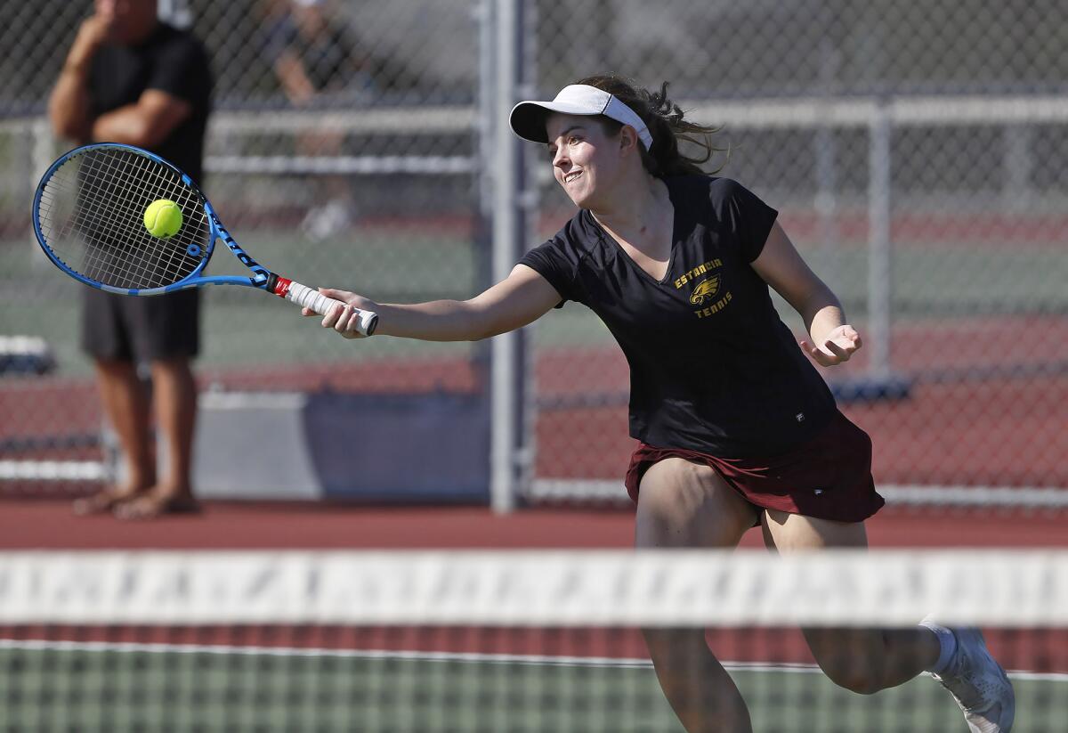 Estancia's Sophia Pearson hits a forehand volley for a point during the Battle for the Bell girls' tennis match.