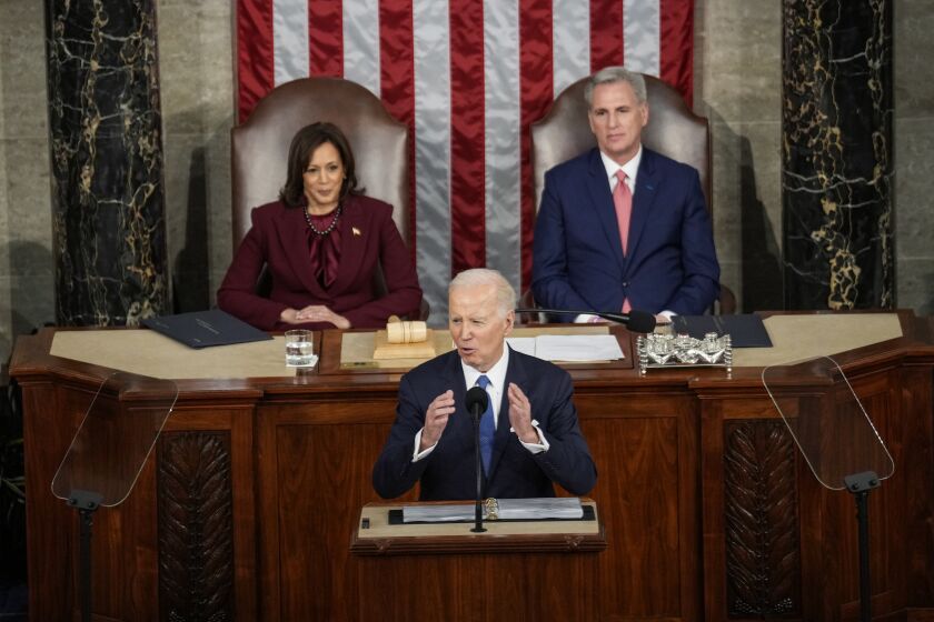 WASHINGTON, DC - FEBRUARY 07: President Joe Biden speaks as Vice President Kamala Harris, left, and Speaker of the House Kevin McCarthy (R-CA), right, listen during a State of the Union address at the U.S. Capitol on Tuesday, Feb. 7, 2023 in Washington, DC. (Kent Nishimura / Los Angeles Times)