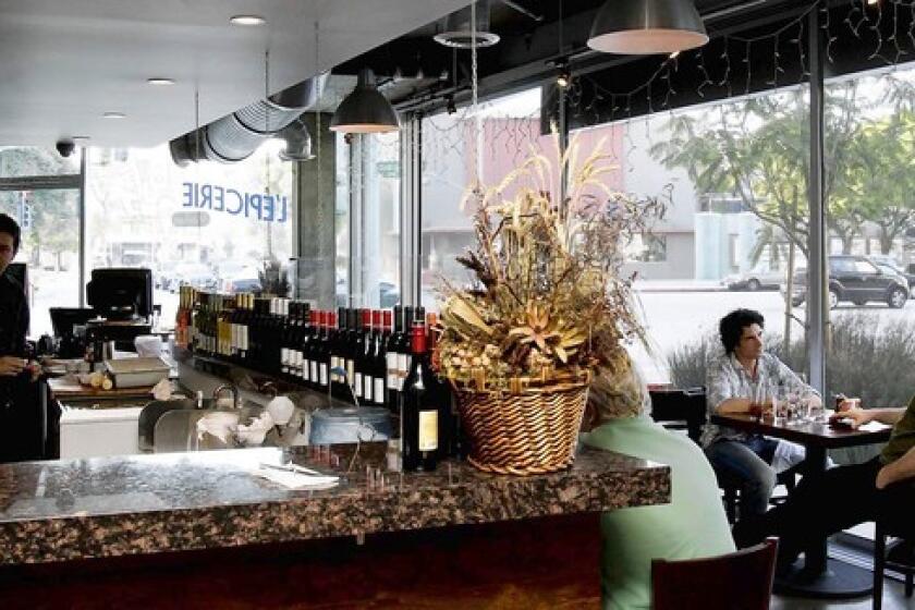 [L'Epicerie Market in Culver City is a bar, a dining room, a bakery and a takeout place.
