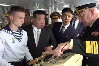 In this image taken from video released by Russian Defense Ministry Press Service on Saturday, Sept. 16, 2023, North Korea's leader Kim Jong Un, center, listens explanations by Admiral Nikolai Yevmenov, Commander-in-Chief of the Russian Navy, right, while visiting the Admiral Shaposhnikov frigate of the Russian navy in the port of Vladivostok, Russian Far East. North Korean leader Kim inspected Russia's nuclear-capable bombers and a warship in its Pacific fleet on Saturday as he continued a trip in Russia’s Far East that has sparked Western concerns about an arms alliance that could fuel Russian President Vladimir Putin’s war on Ukraine.(Russian Defense Ministry Press Service via AP)