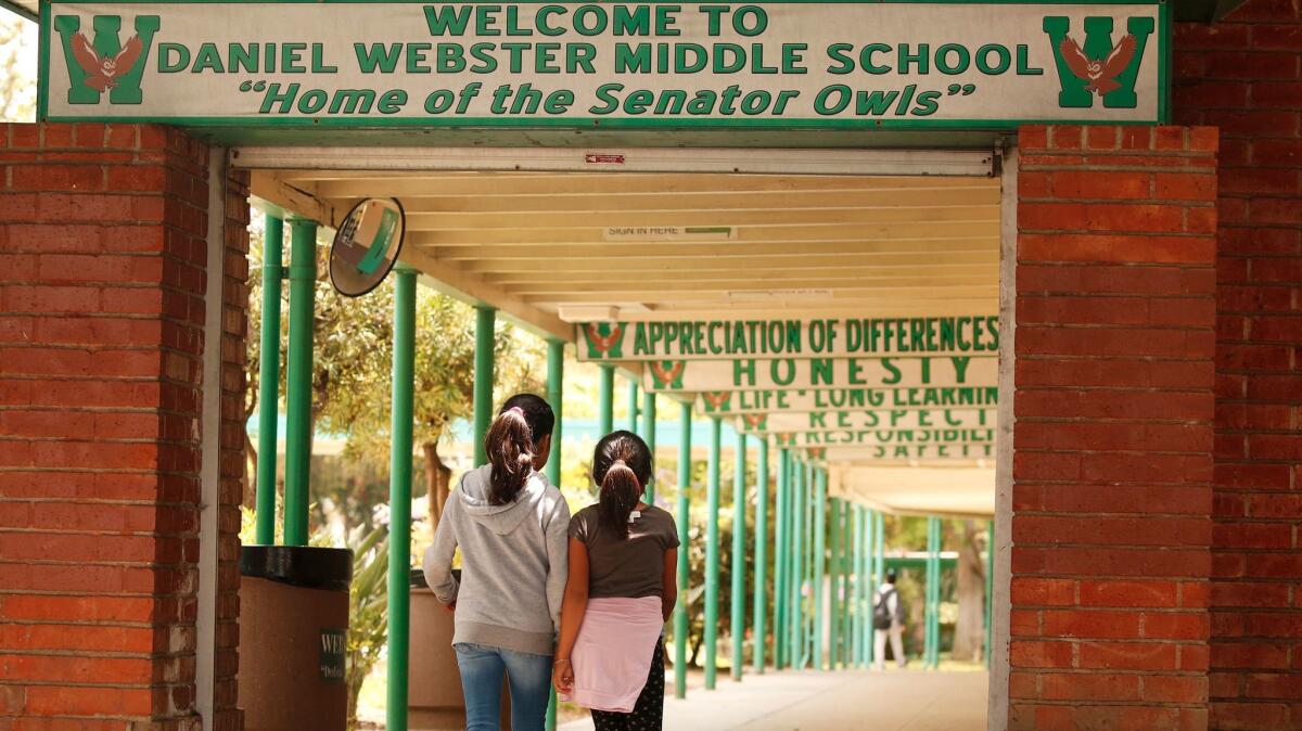 The conflict between charters and traditional public schools was the crux of Tuesday's school board election, but it also reaches the campus level at places like Daniel Webster Middle School, which co-exists with Magnolia Science Academy 4.