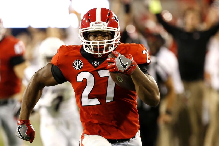 Georgia tailback Nick Chubb (27) runs on the way to a touchdown in the second half against Mississippi State during an NCAA college football game Saturday, Sept. 23, 2017, in Athens, Ga. (Joshua L. Jones/Athens Banner-Herald via AP)