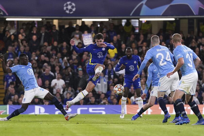 Chelsea's Andreas Christensen, center, scores his side's opening goal during the Champions League group H soccer match between Chelsea and Malmo at the Stamford Bridge stadium in London, Wednesday, Oct. 20, 2021. (Adam Davy/PA via AP)