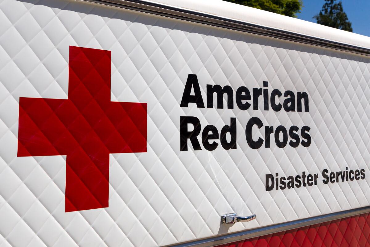 American Red Cross Disaster Services vehicle and logo.