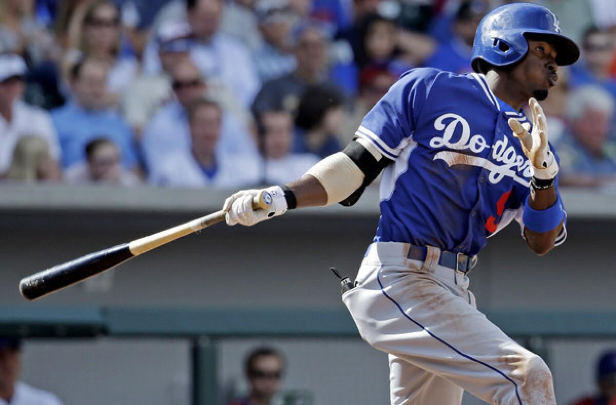 Dee Gordon, who had two hits including an RBI-triple against the Cubs on Friday, appears to have won the starting spot at second base for the Dodgers.