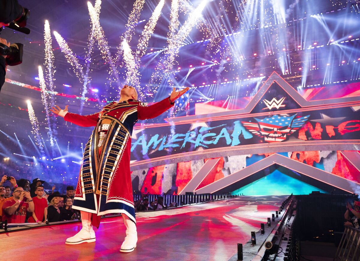 Cody Rhodes makes his entrance during WrestleMania 38 in Arlington, Texas, on April 3, 2022. Rhodes will be part of the main event for WrestleMania 39 in Los Angeles on Sunday, April 2, 2023, against Roman Reigns. (WWE via AP)