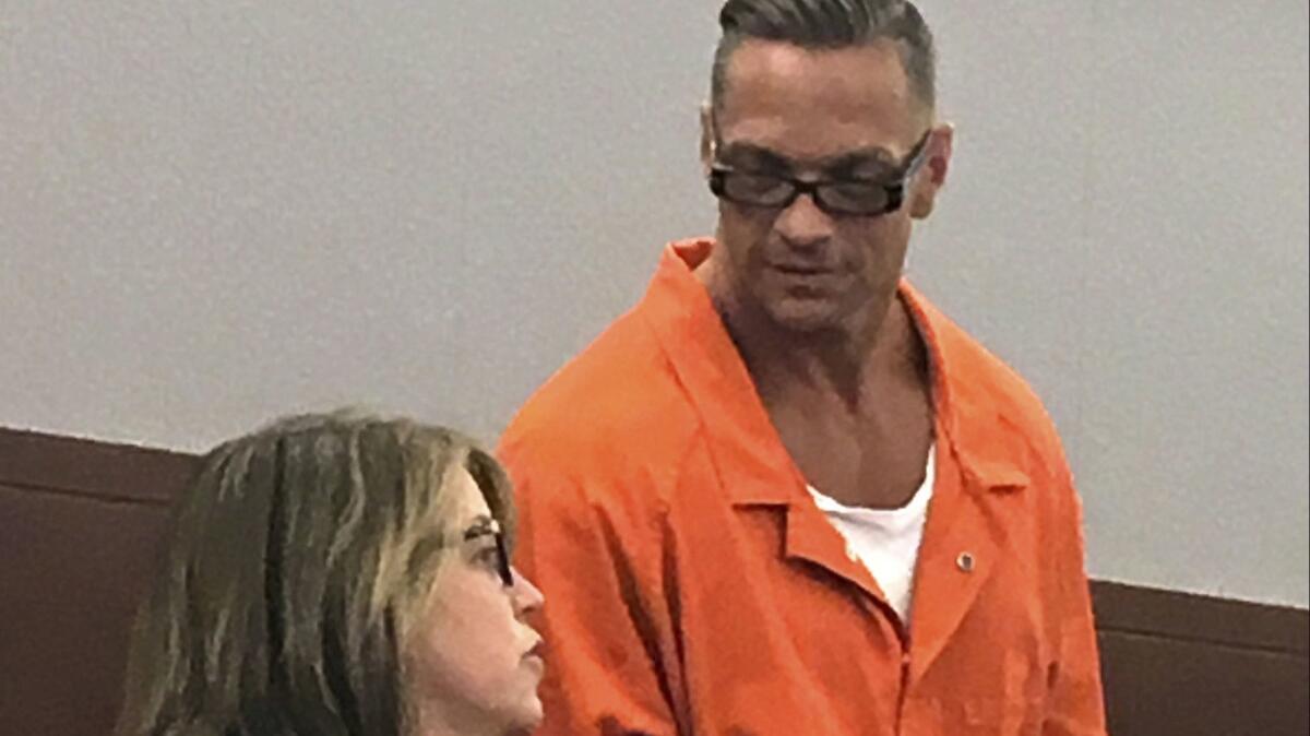 Nevada death row inmate Scott Dozier confers with his attorney during a court appearance in August 2017.