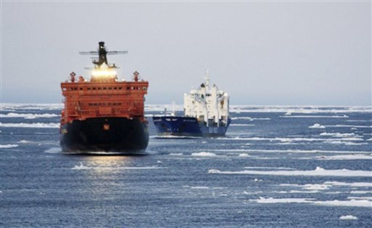 In this photo released by Beluga Shipping on Friday, Sept. 11, 2009, a pair of German merchant ships are seen as they traverse the fabled Northeast Passage. Two German ships have traversed the fabled Northeast Passage, having arrived in Siberia from South Korea by traveling around Russia's Arctic coast line. Global warming and melting ice made the journey possible. (AP Photo/Beluga Shipping)