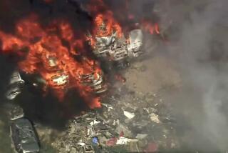A two-alarm blaze erupted at an auto recycling center in the Antelope Valley on July 25, 2024. (KTLA)