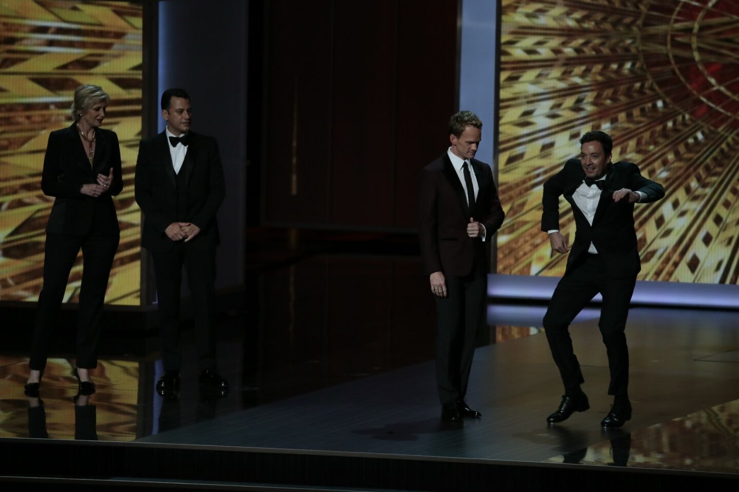 After several sterling Tony Awards hosting jobs, everyone seemed primed to see him bring that same magic to the Emmys. Sadly, NPH (second from right) is only a mortal. Same as you and me. And like you and me, he stumbled his way through an awkward and interminable opening film and monologue that was extended to painfully unfunny lengths through the addition of four former Emmy hosts (including, from left, Jane Lynch, Jimmy Kimmel and Jimmy Fallon).