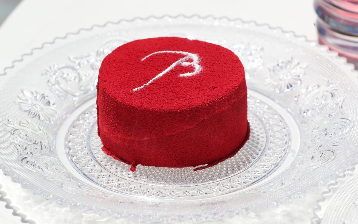 A strawberry velvet cake in honor of Baccarat is one of the selections at the luxury cake truck Lady M.