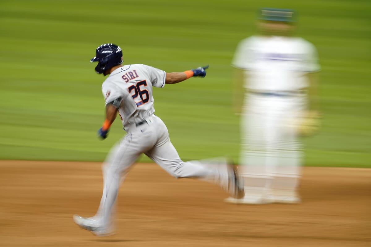 Hey Siri! Astros rookie homers twice in 15-1 win at Rangers - The