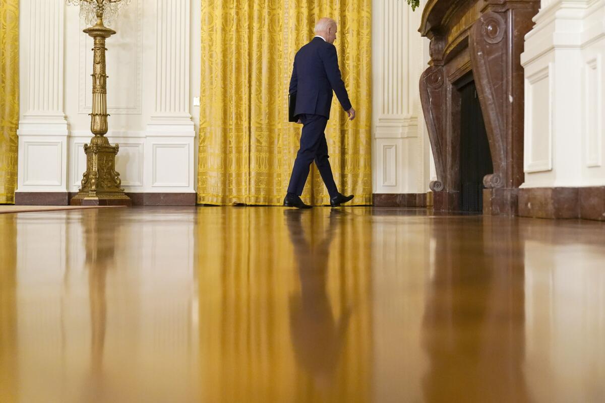 President Joe Biden leaves after speaking about Russia in the East Room of the White House, Thursday, April 15, 2021, in Washington. (AP Photo/Andrew Harnik)