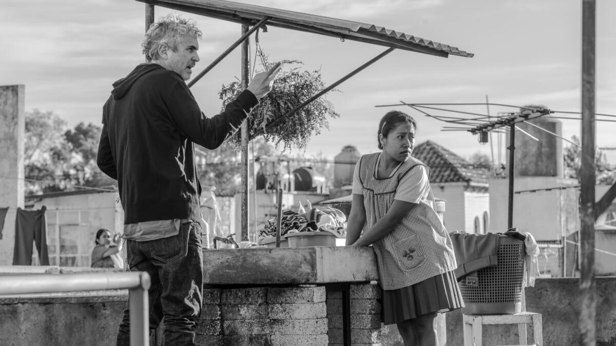 Alfonso Cuarón on the set of his latest film, "Roma." Could it earn Netflix its first Best Picture Oscar nomination?