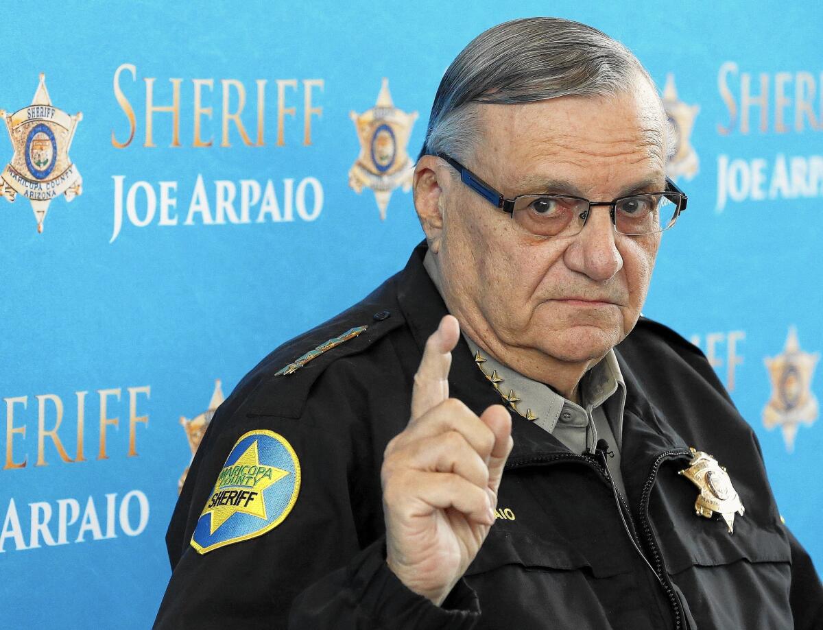 Maricopa County Sheriff Joe Arpaio, shown in 2013, has acknowledged that he violated federal court orders in a racial profiling case.