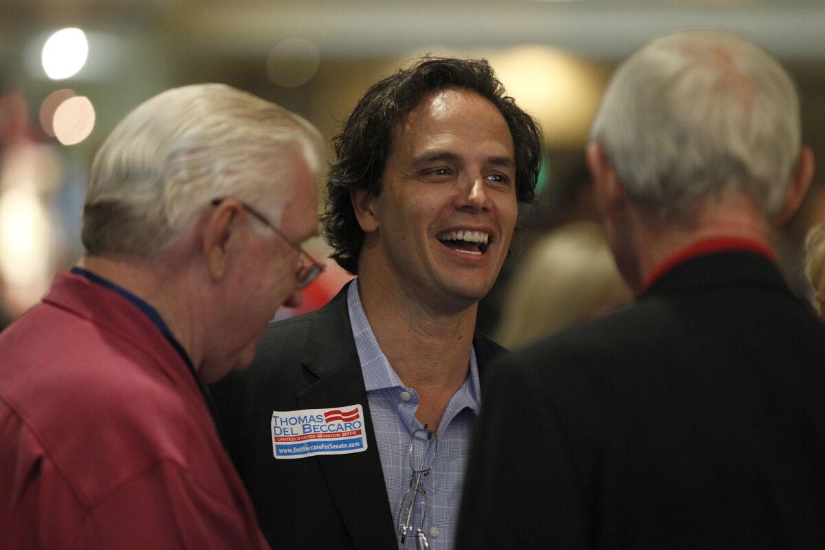 U.S. Senate GOP candidate Tom Del Beccaro speaks with supporters a California Republican Party Fall Convention on Anaheim in September.