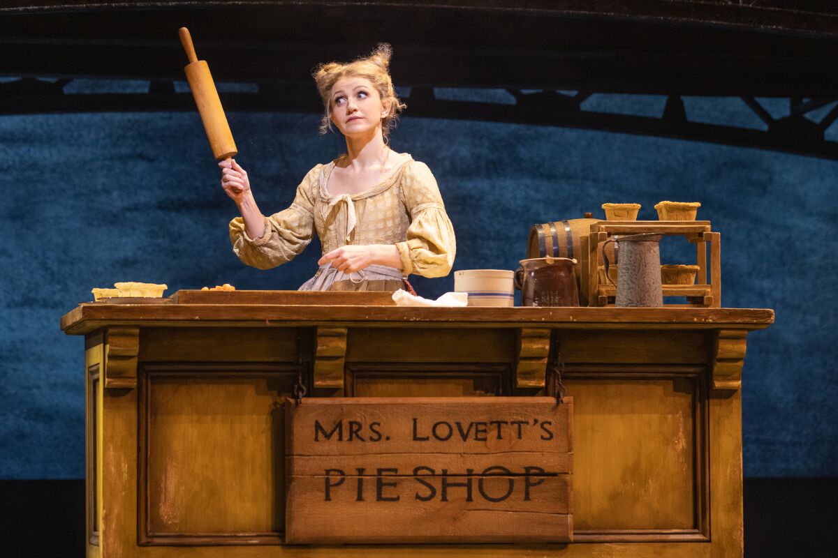 Annaleigh Ashford holds a rolling pin in "Sweeney Todd."
