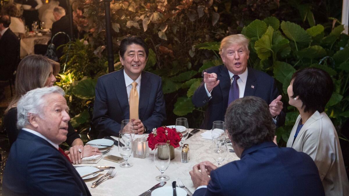 President Trump and Japanese Prime Minister Shinzo Abe sit down for dinner at Trump's Mar-a-Lago resort.