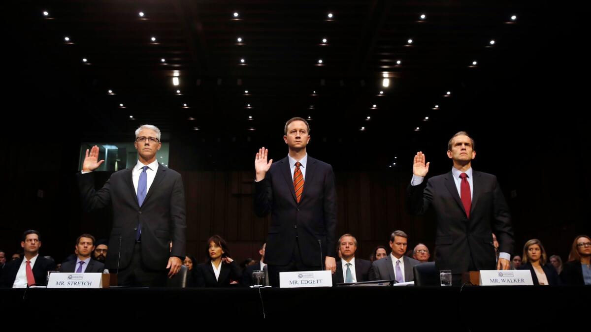 From left, Facebook's general counsel Colin Stretch, Twitter's acting general counsel Sean Edgett and Google Senior Vice President and general counsel Kent Walker.
