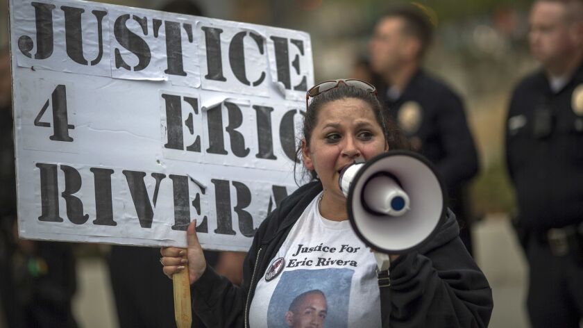 Valerie Rivera calls for justice last month for her son Eric, who was killed by police in a shooting that police commissioners declared justified.
