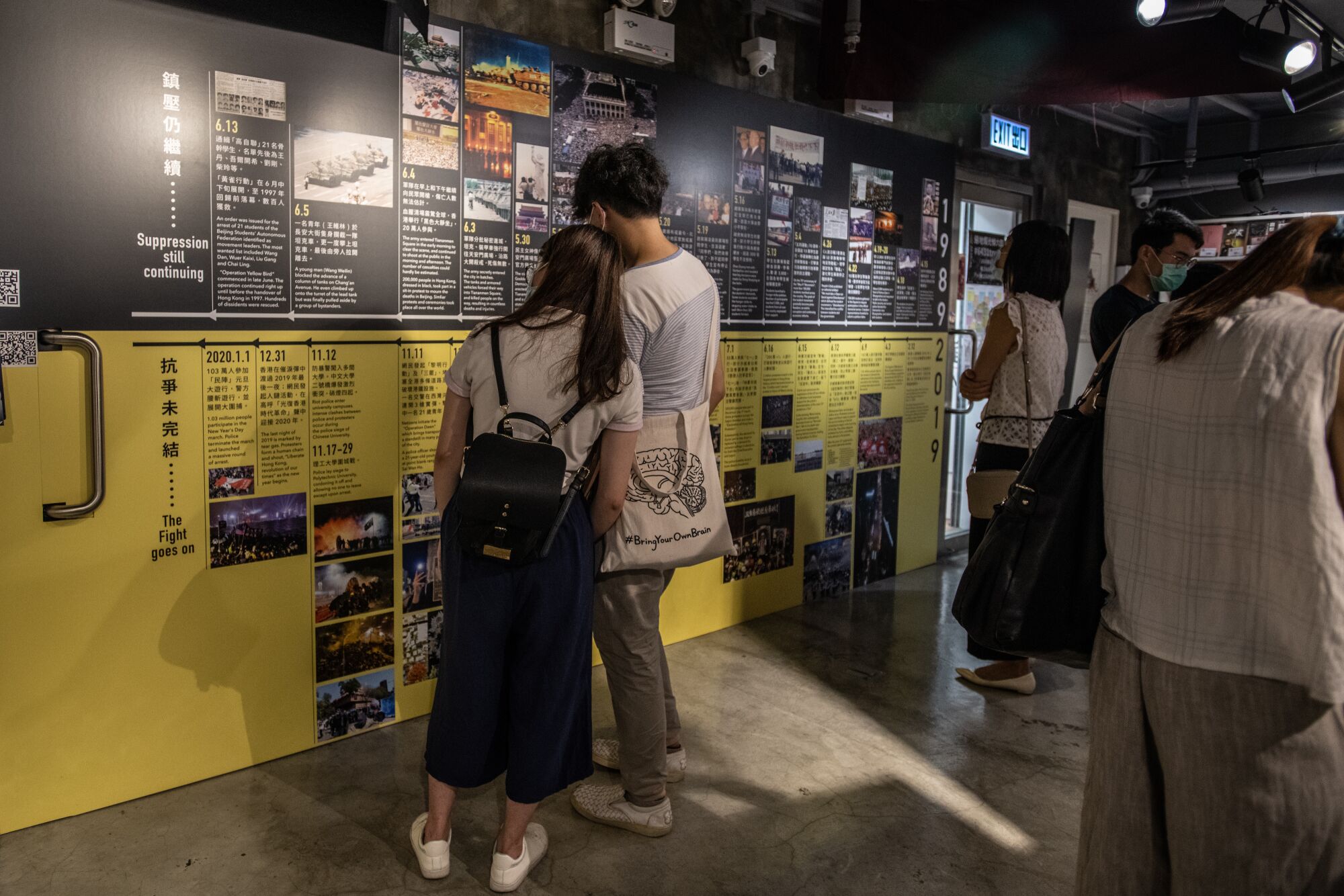 A couple looks at a display at the June 4 museum in Mong Kok, Hong Kong.