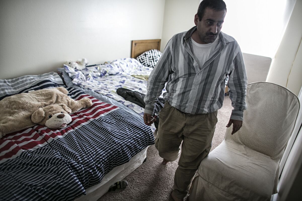 Syrian refugee Ahmad Zarour, 40, lives in a two bedroom apartment with his wife and five children.