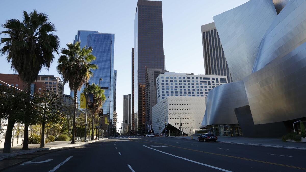 The Walt Disney Concert Hall (right) and The Broad museum, as seen from Grand Avenue.