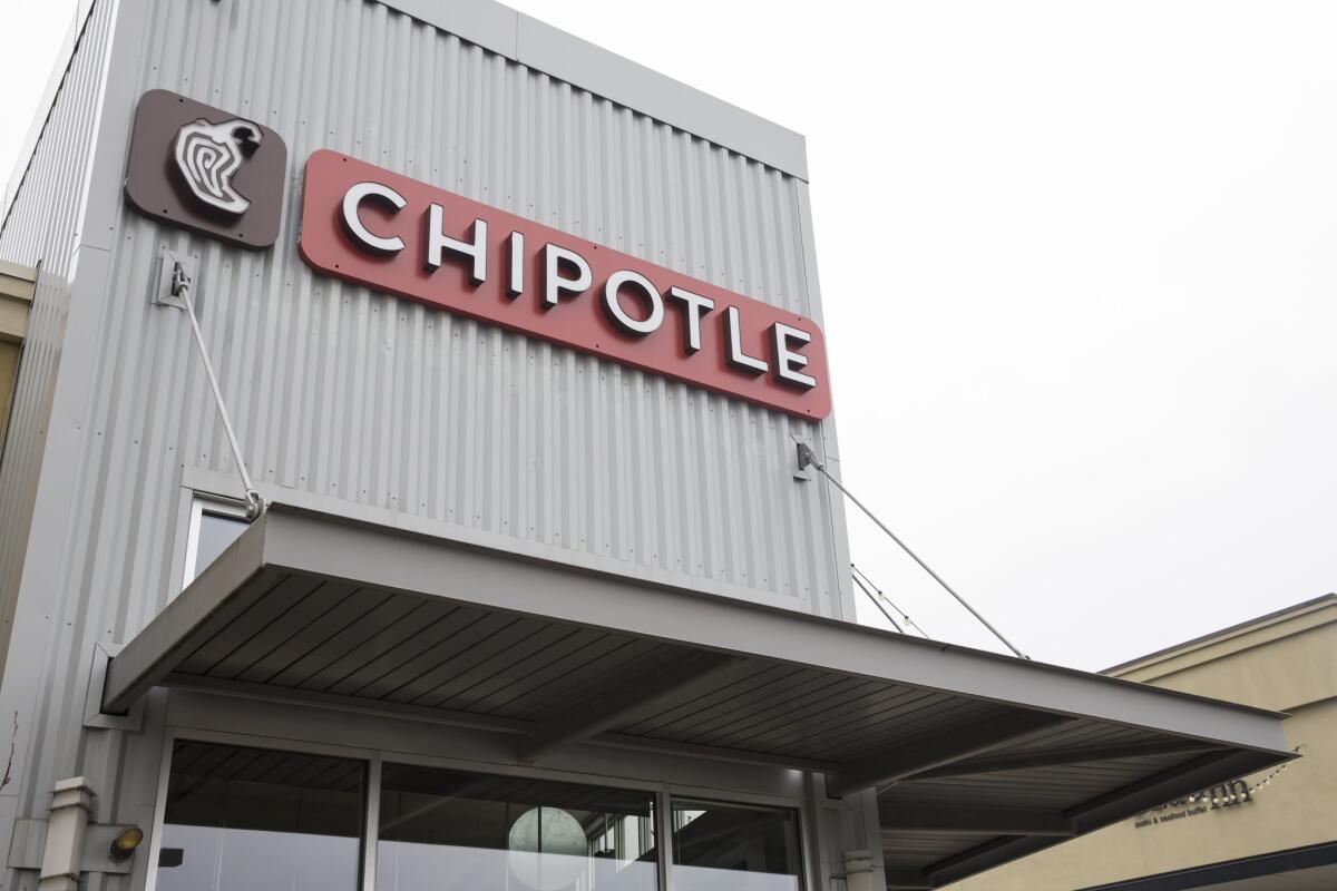 Chipotle shares increased Monday morning after the Centers for Disease Control said it had closed its investigation of an E. coli outbreak at the chain. Above, a restaurant in Seattle.