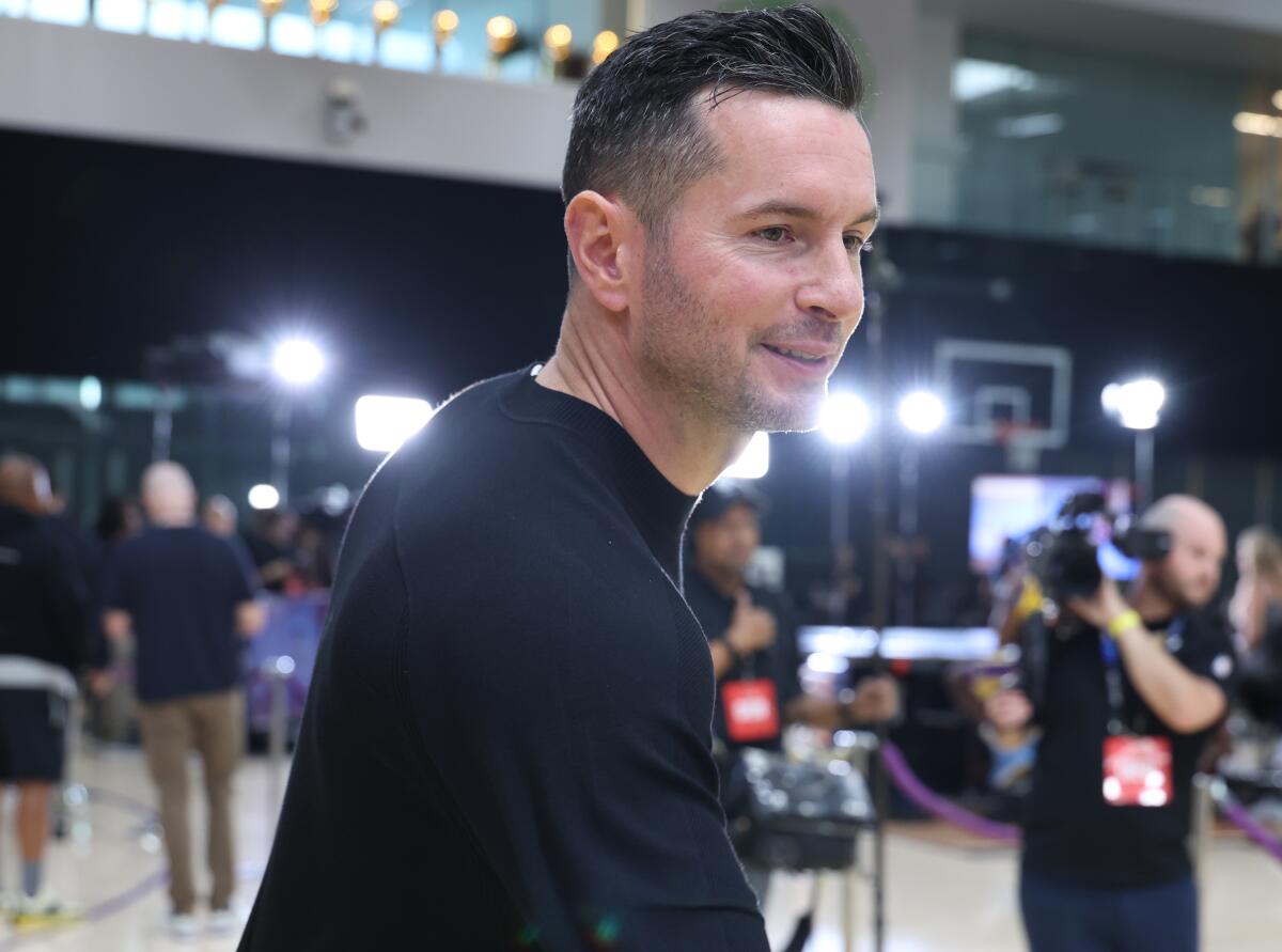 Lakers coach JJ Redick drops by media day before the opening of training camp.