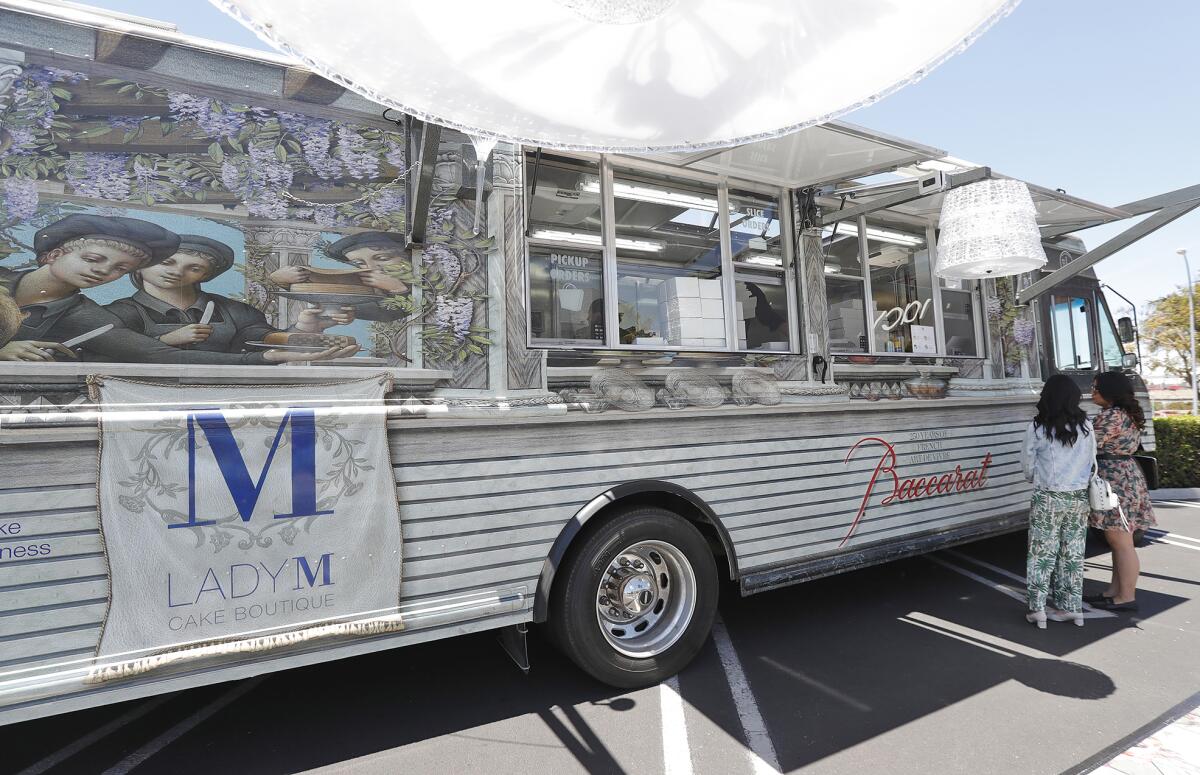 The luxury cake truck Lady M parked outside Macy's at South Coast Plaza.