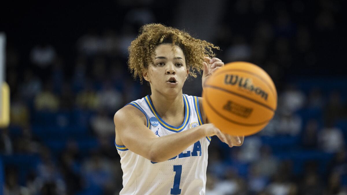 UCLA guard Kiki Rice passes during a win over California Baptist in the first round of the NCAA tournament on March 23.