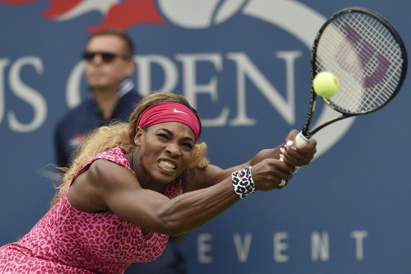 Serena Williams hits a return to Varvara Lepchenko during the U.S. Open on Saturday.