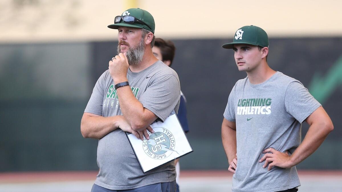 Sage Hill coach BJ Crabtree, left, shown in 2018, and his team lost 55-8 to La Cañada Flintridge Prep on Friday, marking the program's first loss in the regular season since Oct. 6, 2017.