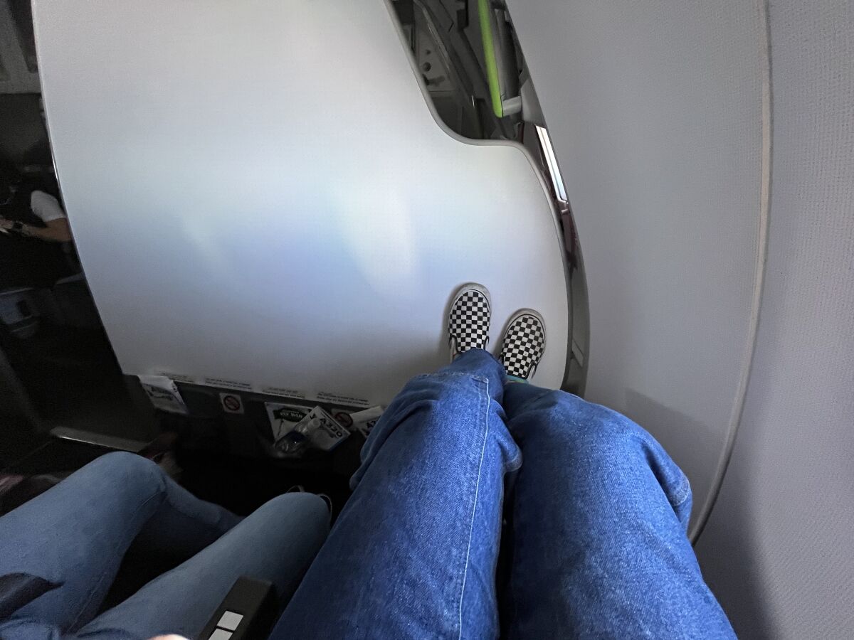 Legs to show leg room on a flight. 