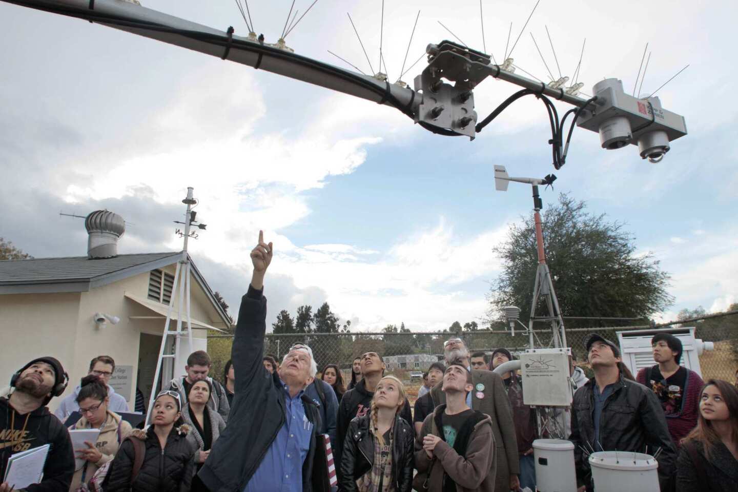 William Russell, former head of the Pierce College weather station, explains how a new device measures solar radiation. L.A. County's hottest temperature, 119 degrees, was recorded at the station in 2006.