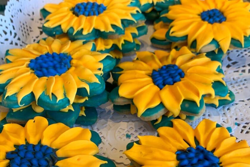 Girard Gourmet in La Jolla made blue-and-yellow sunflower cookies to show support for Ukraine after Russia's invasion.