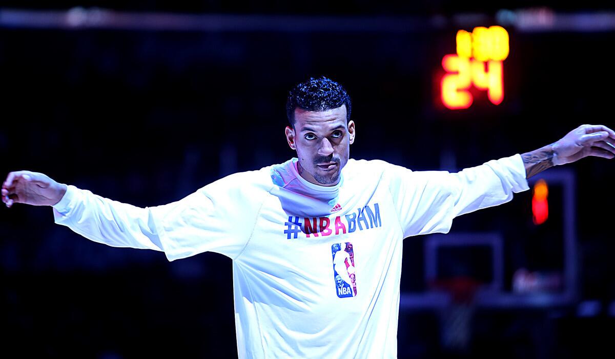 Clippers forward Matt Barnes warms up before a game last season at Staples Center.