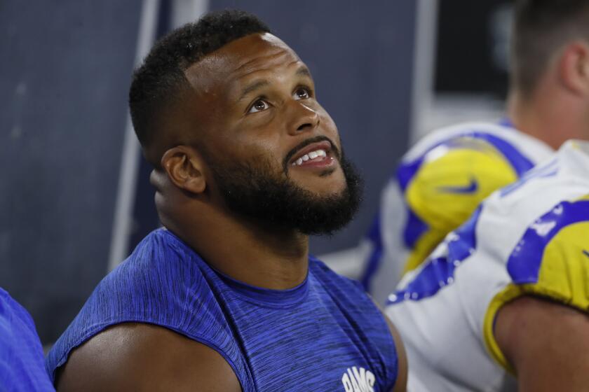 Inglewood, CA, Saturday, August 13, 2022 - Los Angeles Rams defensive tackle Aaron Donald looks on from the sideline during a preseason game against the Chargers at SoFi Stadium. (Robert Gauthier/Los Angeles Times)