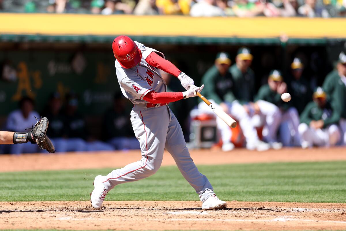Taylor Ward connects for a two-run homer during the Angels' 11-run third inning against the Athletics on April 1, 2023.
