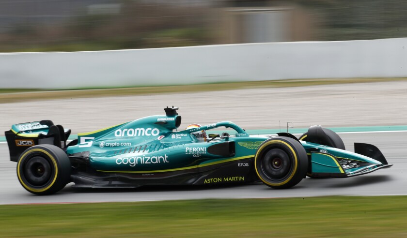 Aston Martin driver Sebastian Vettel of Germany steers his car during a Formula One pre-season testing session at the Catalunya racetrack in Montmelo, just outside of Barcelona, Spain, Friday, Feb. 25, 2022. (AP Photo/Joan Monfort)