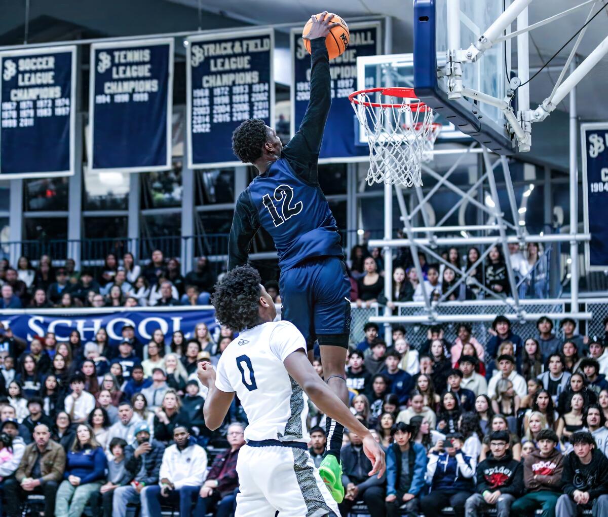 Bryce Cofield of Sierra Canyon goes up for a dunk in front of St. John Bosco's Brandon McCoy.