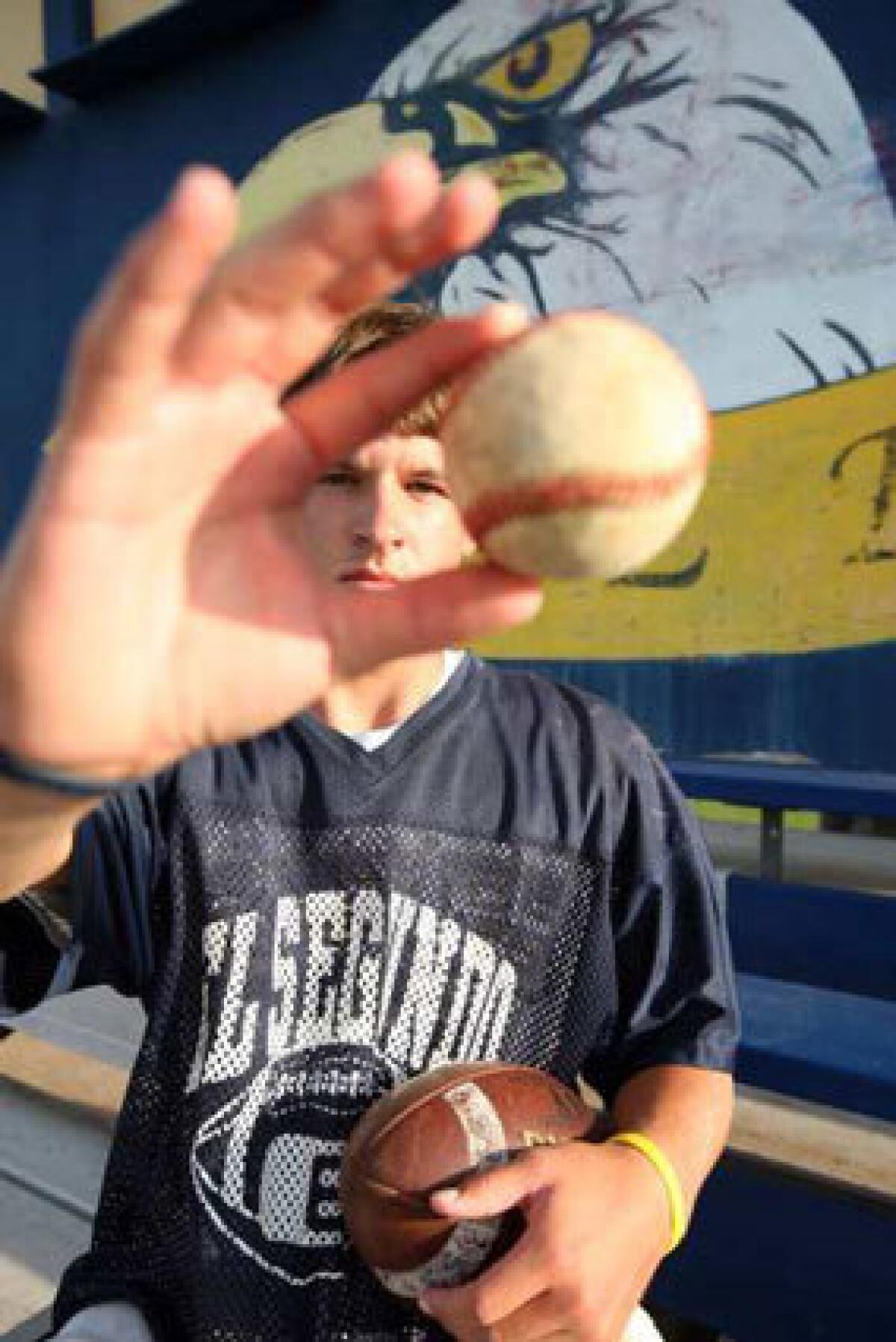 El Segundo sophomore Michael Bundy throws a baseball right-handed.