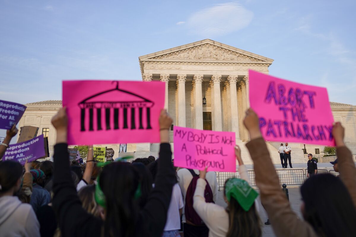 Protesters gather outside the Supreme Court after a draft opinion in an abortion case leaked. 