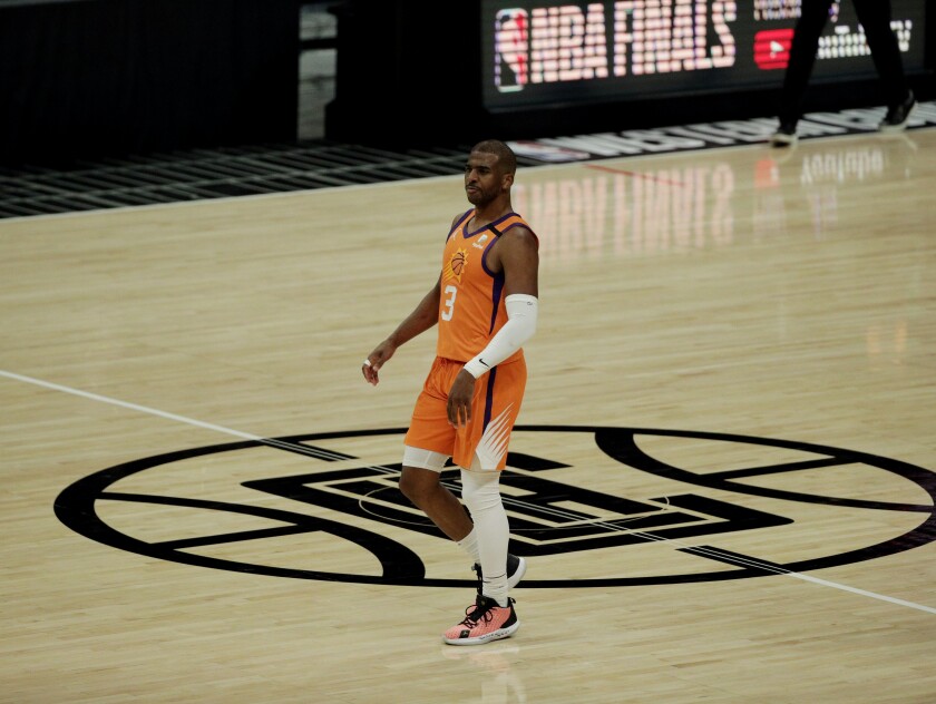 Chris Paul saunters down the court after sinking a three-pointer in Game 6.