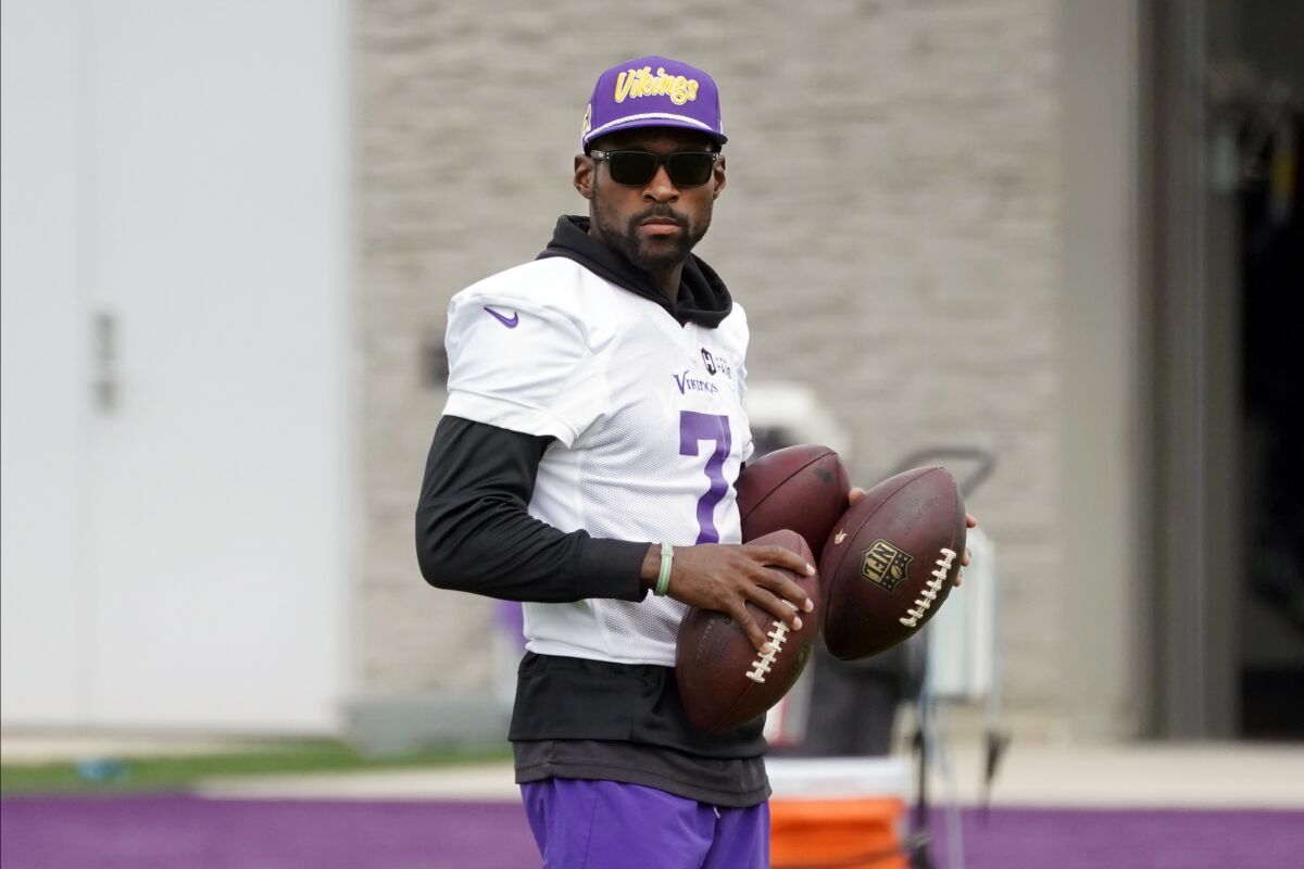 Minnesota Vikings' Patrick Peterson, entering his 11th season in the NFL and his first with the Vikings watches during NFL football training camp, Thursday, Aug. 5, 2021, in Eagan, Minn. Peterson took advantage of a new rule to make the switch to his long-favored No. 7, with cornerbacks now allowed to wear any number from 1 to 49. Several of Peterson's peers around the league have done the same, many of them cornerbacks. (AP Photo/Jim Mone)