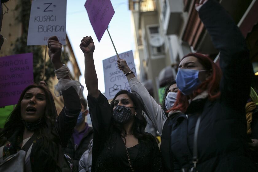 Protesters chant slogans during a rally to mark International Women's Day in Istanbul, Monday, March 8, 2021.Thousands of people joined the march to denounce violence against women in Turkey, where more than 400 women were killed last year. The demonstrators are demanding strong measures to stop attacks on women by former partners or family members as well as government commitment to a European treaty on combatting violence against women. (AP Photo/Emrah Gurel)